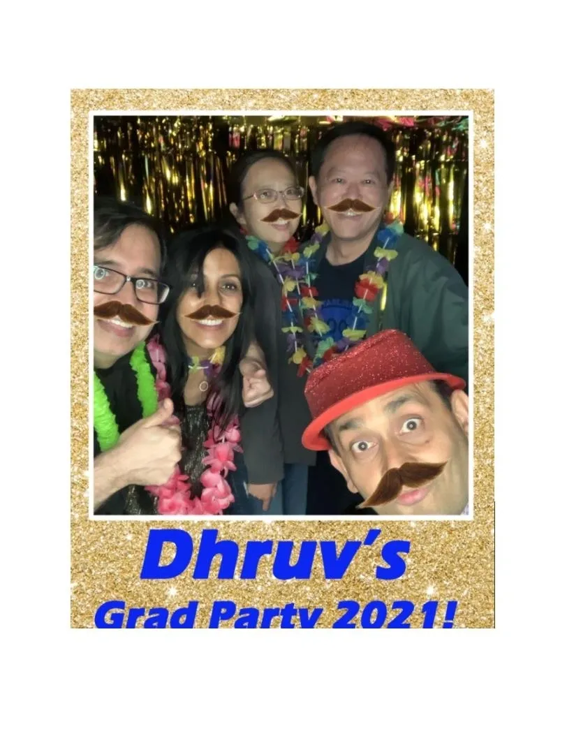 Five people wearing fake mustaches, leis, and festive accessories pose together at a photo booth. Text at the bottom reads, "Dhruv's Grad Party 2021!.