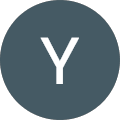 A dark blue circle with a white, stylized letter "Y" in the center.